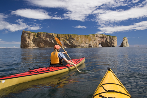 Kayaker paddling near Perce Rock